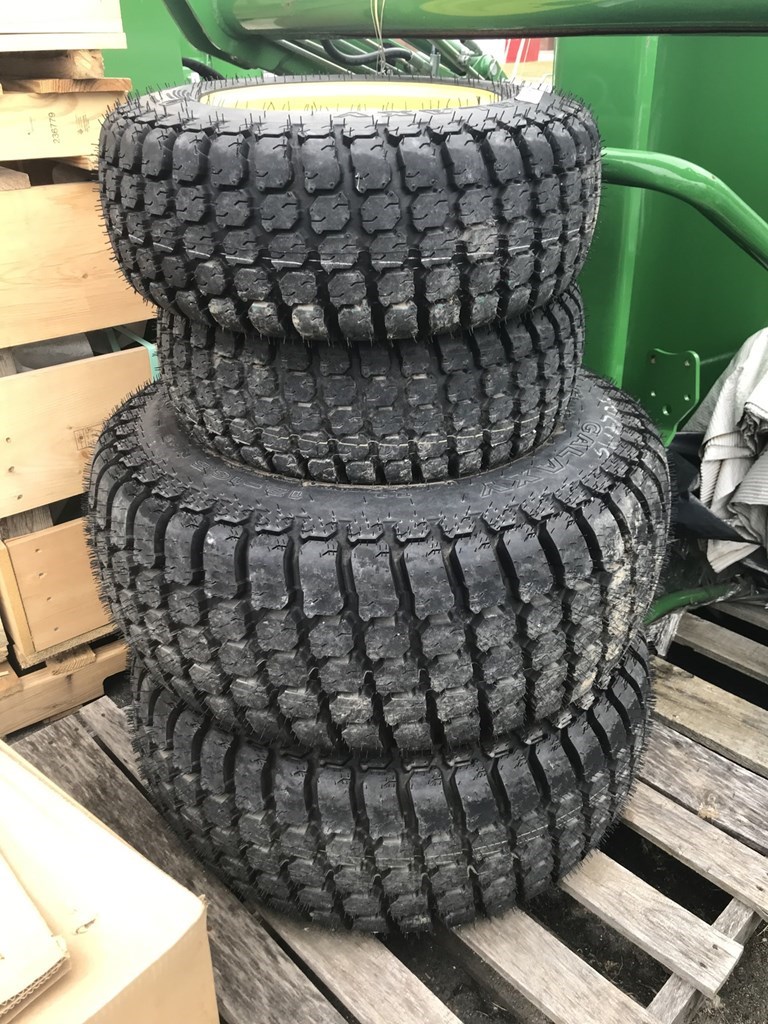 John Deere Galaxy 12-16.5 and 23x8.5x12 Tires and Tracks For Sale
